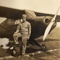 Walter A Rozenberger with training plane